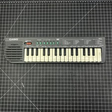Casio SA-2 Mini Electronic Keyboard - WORKS - Missing Battery Cover