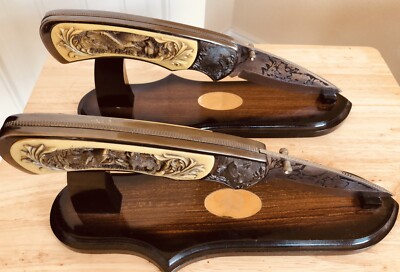 2 Folding Knives With Stands Has A Unique Designs Of Wolfs & Eagles Both Sides