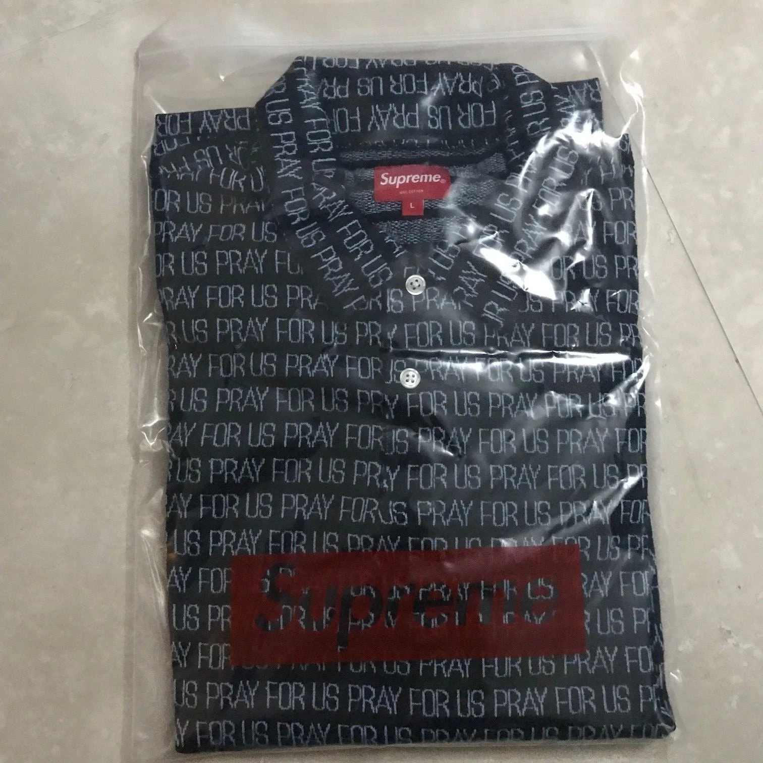 POLO SUPREME PRAY FOR US JACQUARD NOIR taille grande BOITE LOGO Mark Gonzales