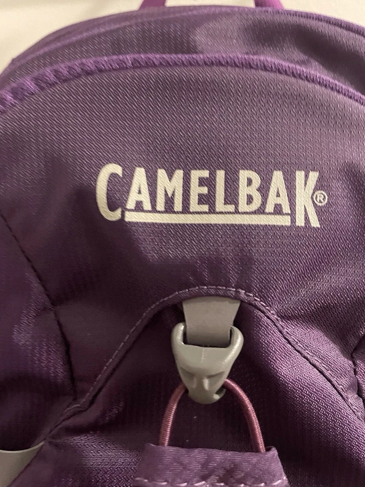 Paquete de hidratación para mujer CamelBak Aventura 18 púrpura excelente Foto 2 de 4