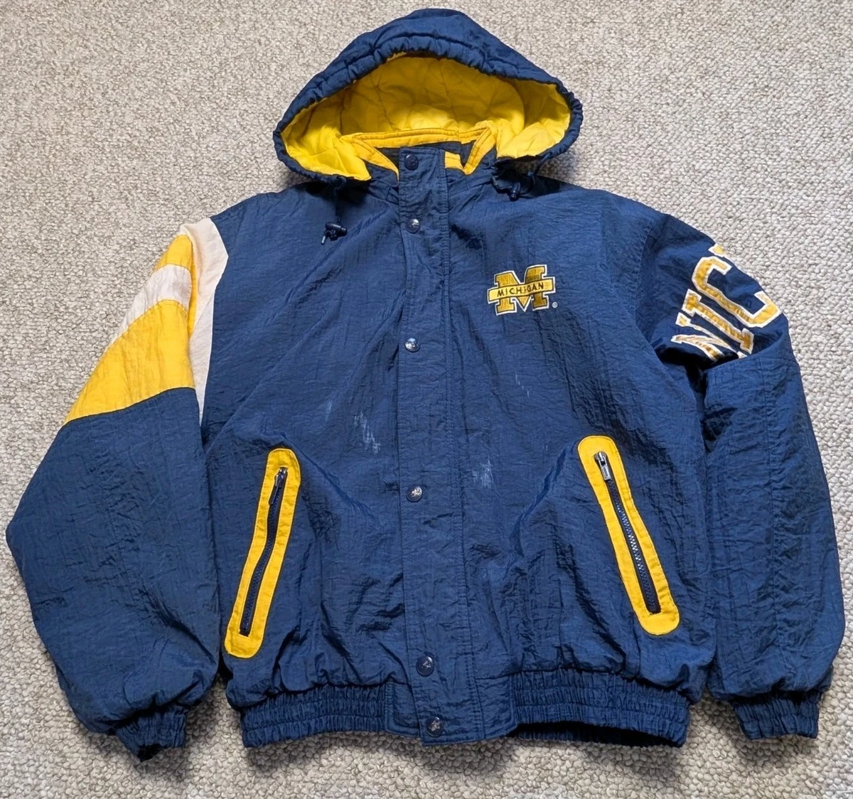 Las mejores ofertas en Chaquetas de la NCAA Starter Michigan