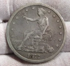 F+ 1877-s Silver TRADE Dollar.