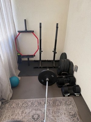 Full workout set with Olympic bar/weights, adjustable dumbbells, squat rack, etc
