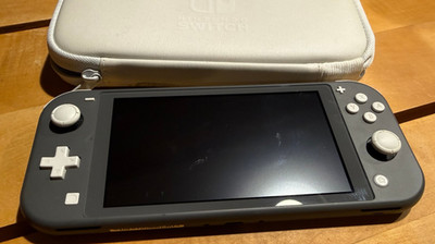 Nintendo Switch Lite**Handkonsole**mit Case+Animal Crossing Spiel
