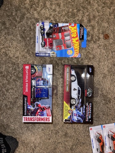 Hot Wheels & Jadatoy Transformers Lot Of 3, Two Optimus Primes & Jazz 935 Turbo