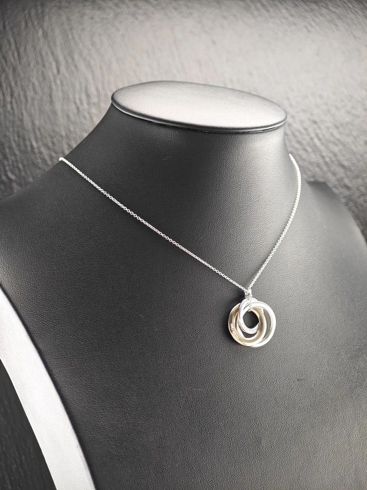 Ожерелье из чистого серебра с переплетающимися кругами золотистого цвета Tiffany & Co. - Изображение 3 из 4