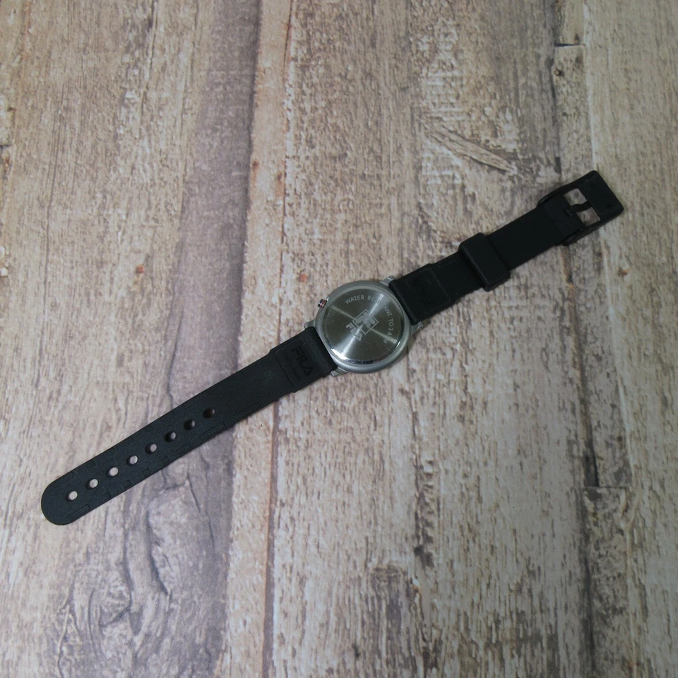 Reloj unisex de cuarzo suizo Fila vintage años 90 34 mm correa de silicona batería nueva Foto 4 de 4