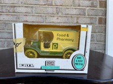 ERTL 1/25 scale diecast Publix 1912 Ford Food and Pharmacy truck bank, NIB