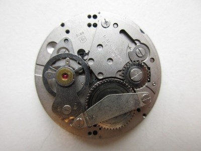 EB Bettlach cal. 8810 vintage watch movement - red date at 3 - running