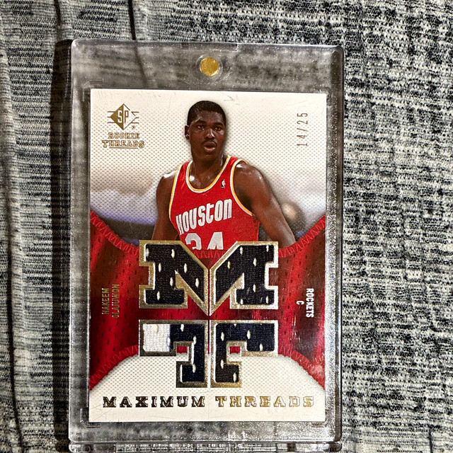 Upper Deck 2007-08 SP Rookie Threads Hakeem Olajuwon MT-HO Rockets 14/25