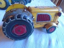 VINTAGE GENERIC FRICTION TRACTOR BY T-N MADE IN JAPAN. MISSING SEAT-DRIVER