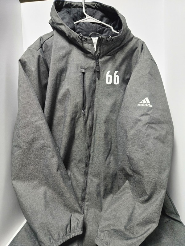 U of Louisville Football Players Sideline Coat by Addidas from 2024 Season. 