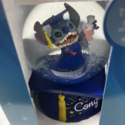 New In Box Stitch Graduation Musical Snow Globe.  Plays Pomp & Circumstance.