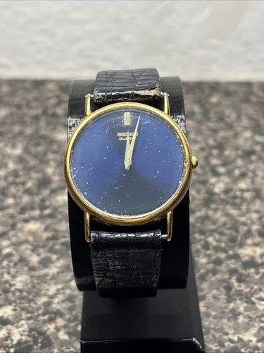 Vintage Seiko Gold Tone Blue Dial Minimalist Men’s Wrist Watch 7N00-7A49