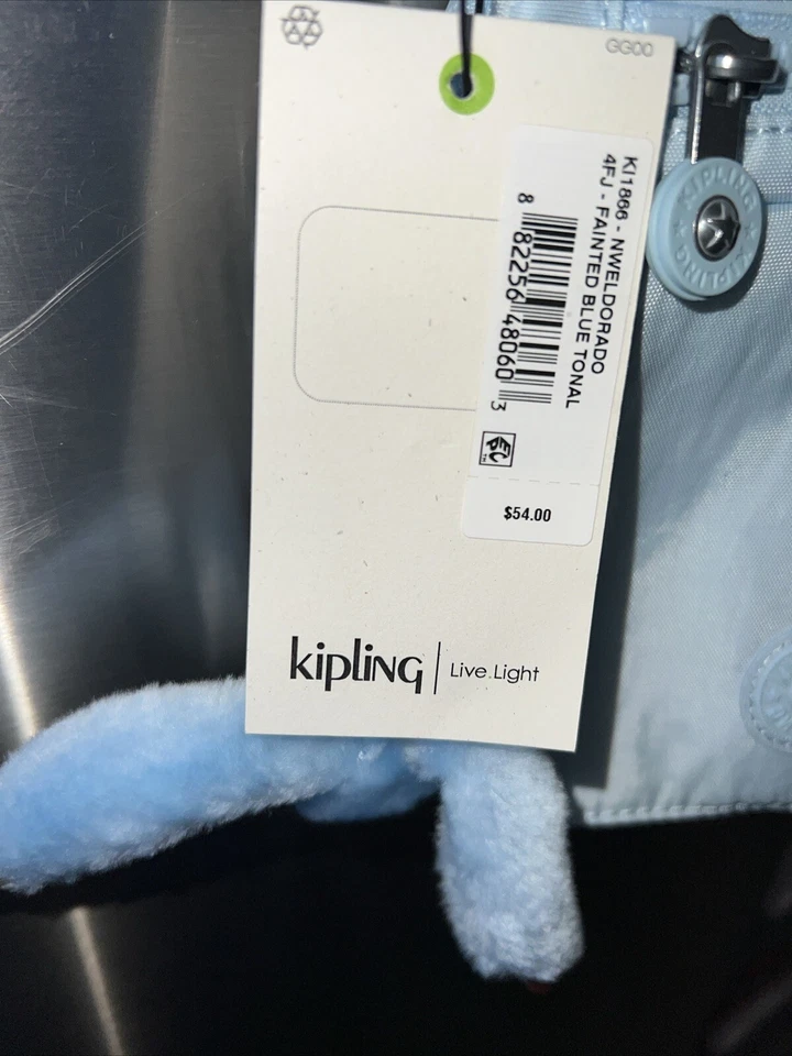 Kipling Nuevo Bolso Bandolera Eldorado Pequeño Plateado Liso Azul Desmayado Nuevo Con Etiquetas Foto 4 de 4