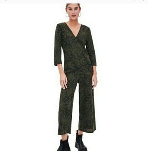 green and black jumpsuit