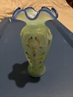 FENTON - M. CAPLINGER (HP) - LIGHT BLUE FLORAL VASE WITH A COBALT BLUE CREST