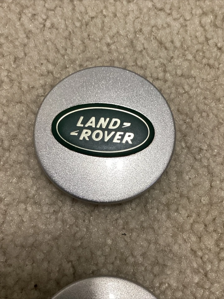 Tapa central Land Rover LR2 LR3 2005-2016 OEM PLATA/VERDE #RRJ500030xxx 1 pieza Foto 2 de 4