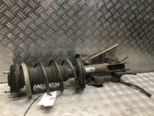 Federbein vorne links  Mazda 2 (DE) 1.3 MZR 62kW 84PS Stoßdämpfer 