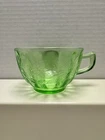 Jeanette Glass Co 'Poinsettia" uranium green depression glass tea cup