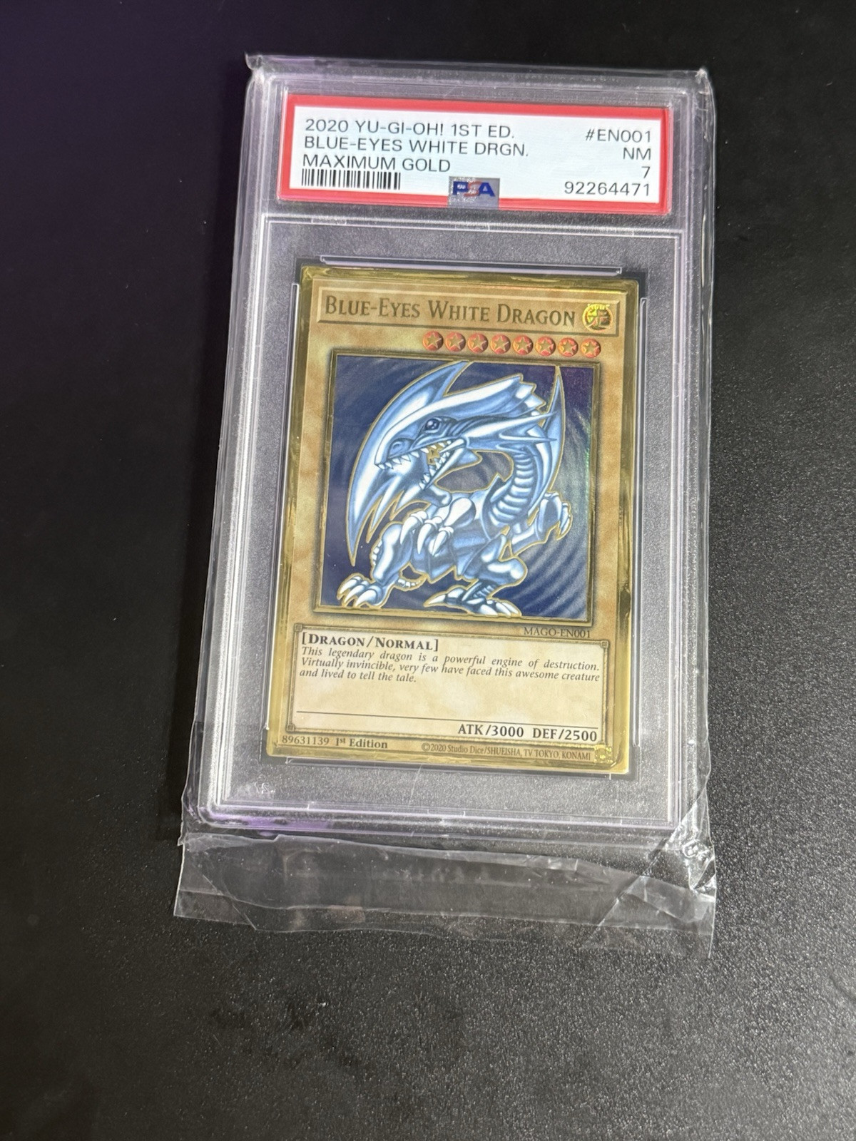 First Edition PSA 7 Blue Eyes White Dragon - Maximum Gold