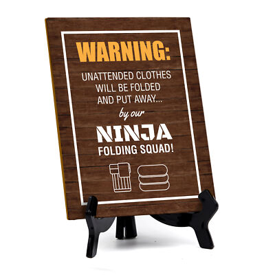 Warning:Unattended clothes will be folded and put away... by our ninja folding..