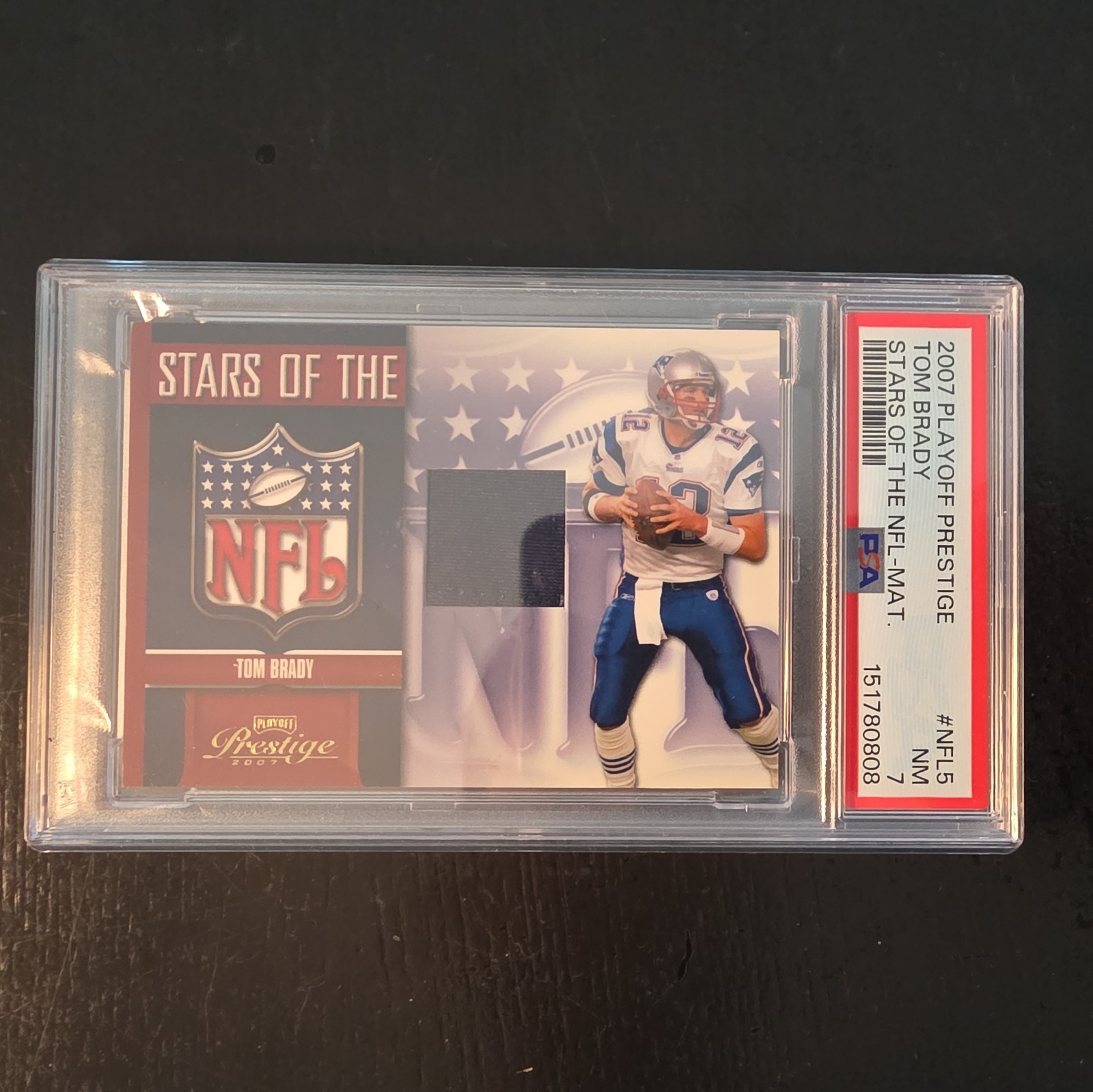 2007 Playoff Prestige Tom Brady NFL Game Used Jersey Card NFL-5 PSA 7 view 2