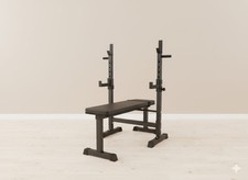 Banc de musculation, pliable, avec support de barre réglable.