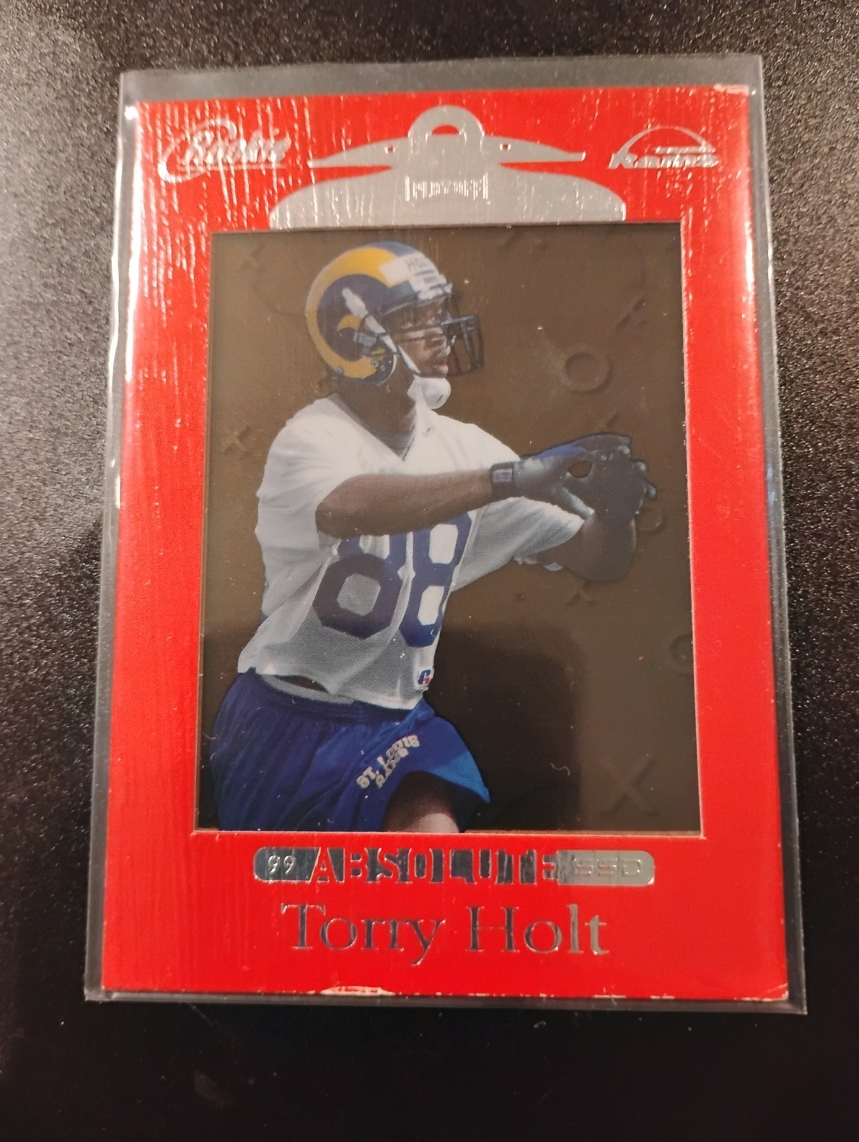 Torry Holt 1999 Playoff Absolute SSD Red Rookie Card #166 NFL Rams 