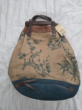 Lucky Brand Drawstring Zip Backpack  canvas T...