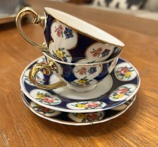 Antique A Pair of Limoges Porcelain Tea Cups and Saucers Hand Painted Floral