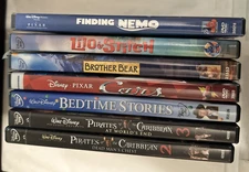 (7) Used Disney DVD's - Cars, Pirates of the Caribbean, Finding Nemo and more