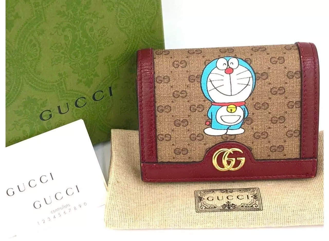 Portefeuille Gucci Doraemon GG motif double pli 647788