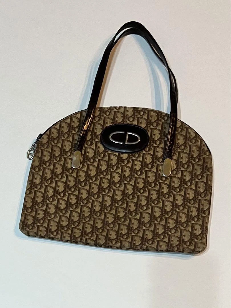 Sac à main vintage motif trotteur Dior CD logo cuir sac bandoulière