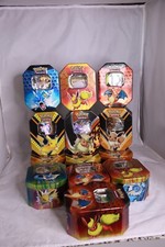 Random Pokemon TCG Mystery Tin Box Full of Go...