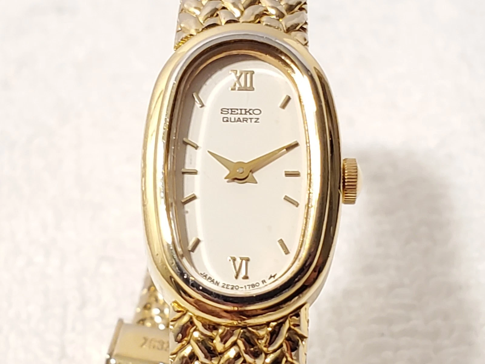 Vintage Seiko Women's Gold Tone Roman Numerals One Jewel Quartz Watch White Dial