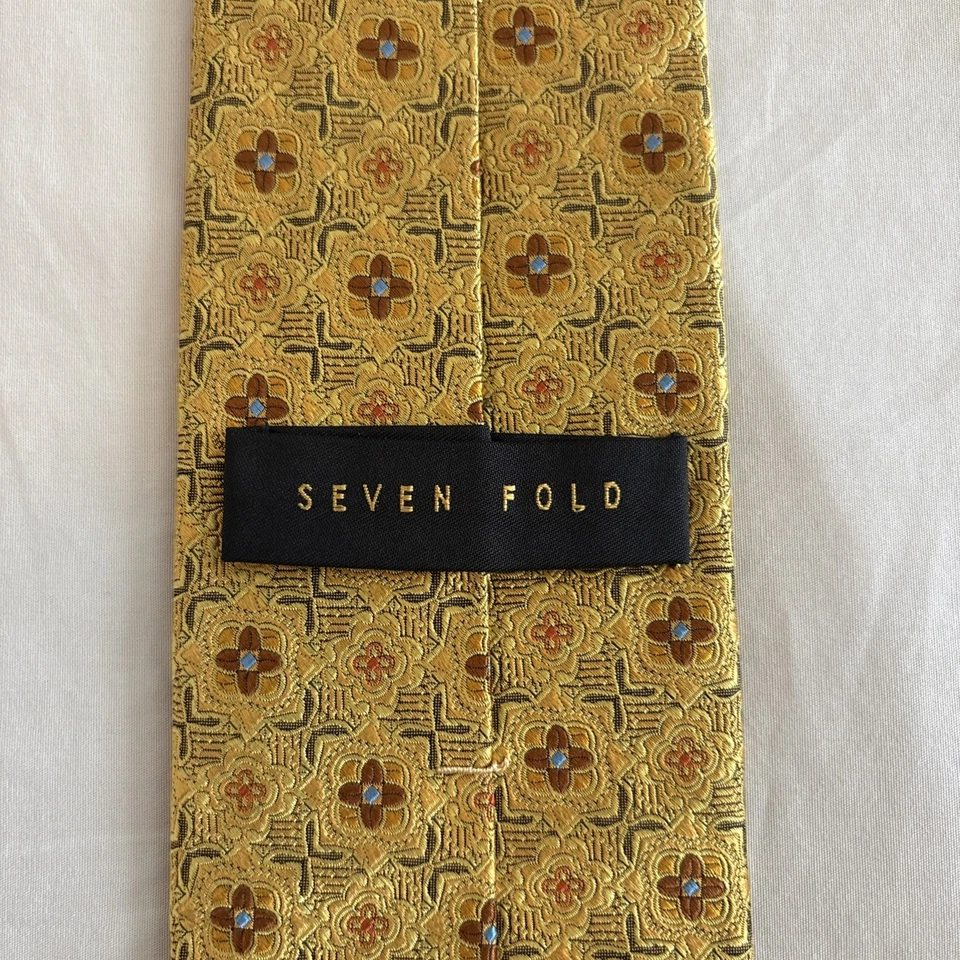 Corbata Robert Talbott Carmel siete pliegues amarillo marrón azul geométrica Foto 3 de 4