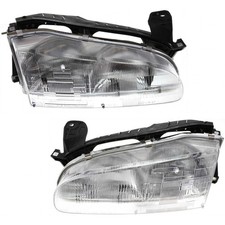 For 1993-1997 Geo Prizm Pair Headlights Driver And Passenger Side-bulbs Incl.