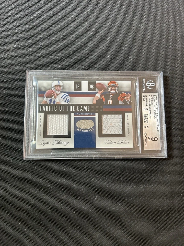 Combos Pop 1 2006 Leaf Fabric of the Game #12 Peyton Manning/Carson Palmer/50 Foto 2 de 4