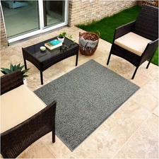 Koeckritz Tweed Premium Mineral Gray Indoor-Outdoor Turf Rug for Patios & Pools