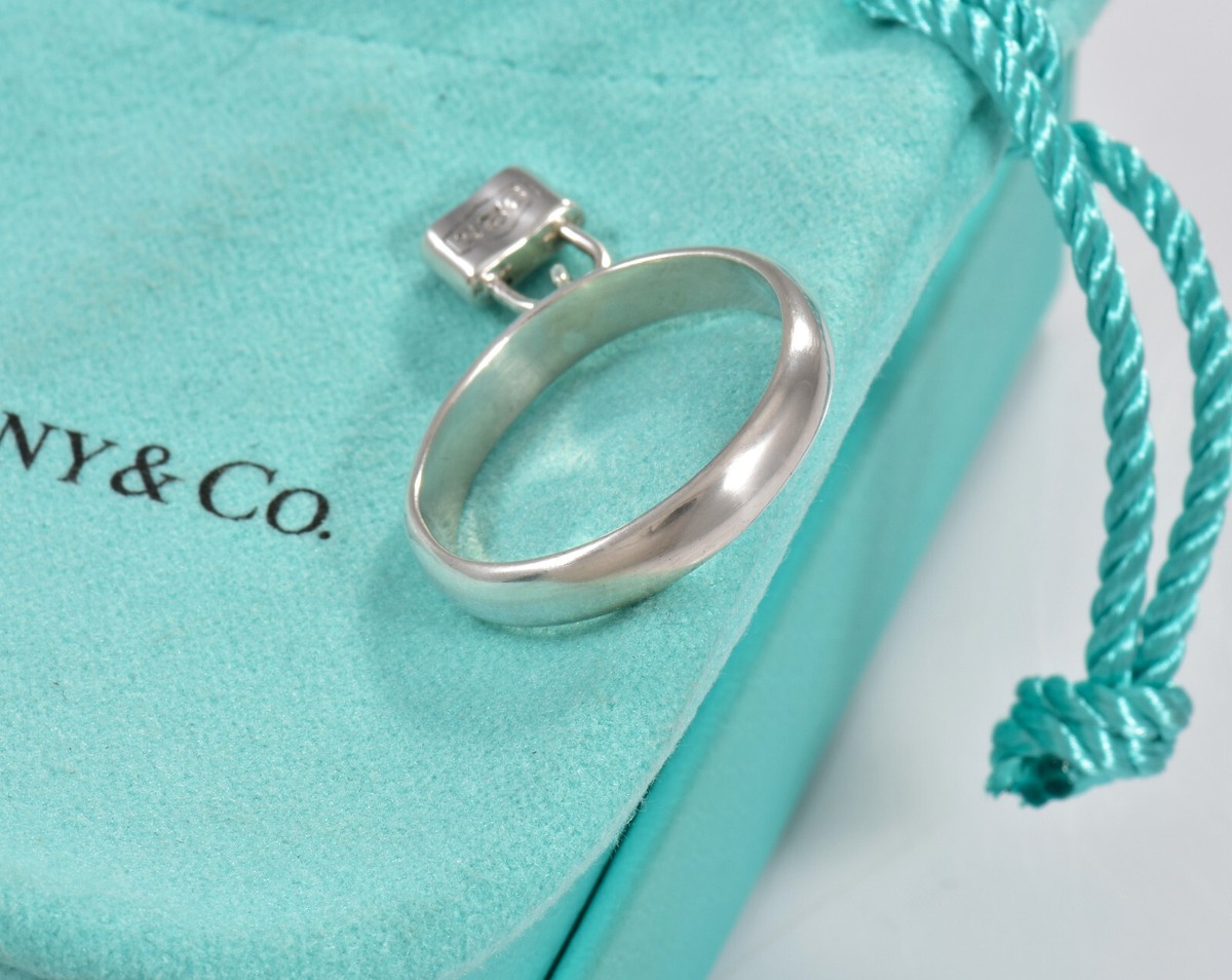Size 8.5 Tiffany & Co 1837 Silver Dangling Lock Band Ring in Size 8.5 Tiffany & Co 1837 Silver Dangling Lock Band Ring in