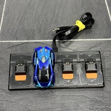 Coche de carreras Anki Overdrive Ground Shock azul negro superdeportivo con estación de carga