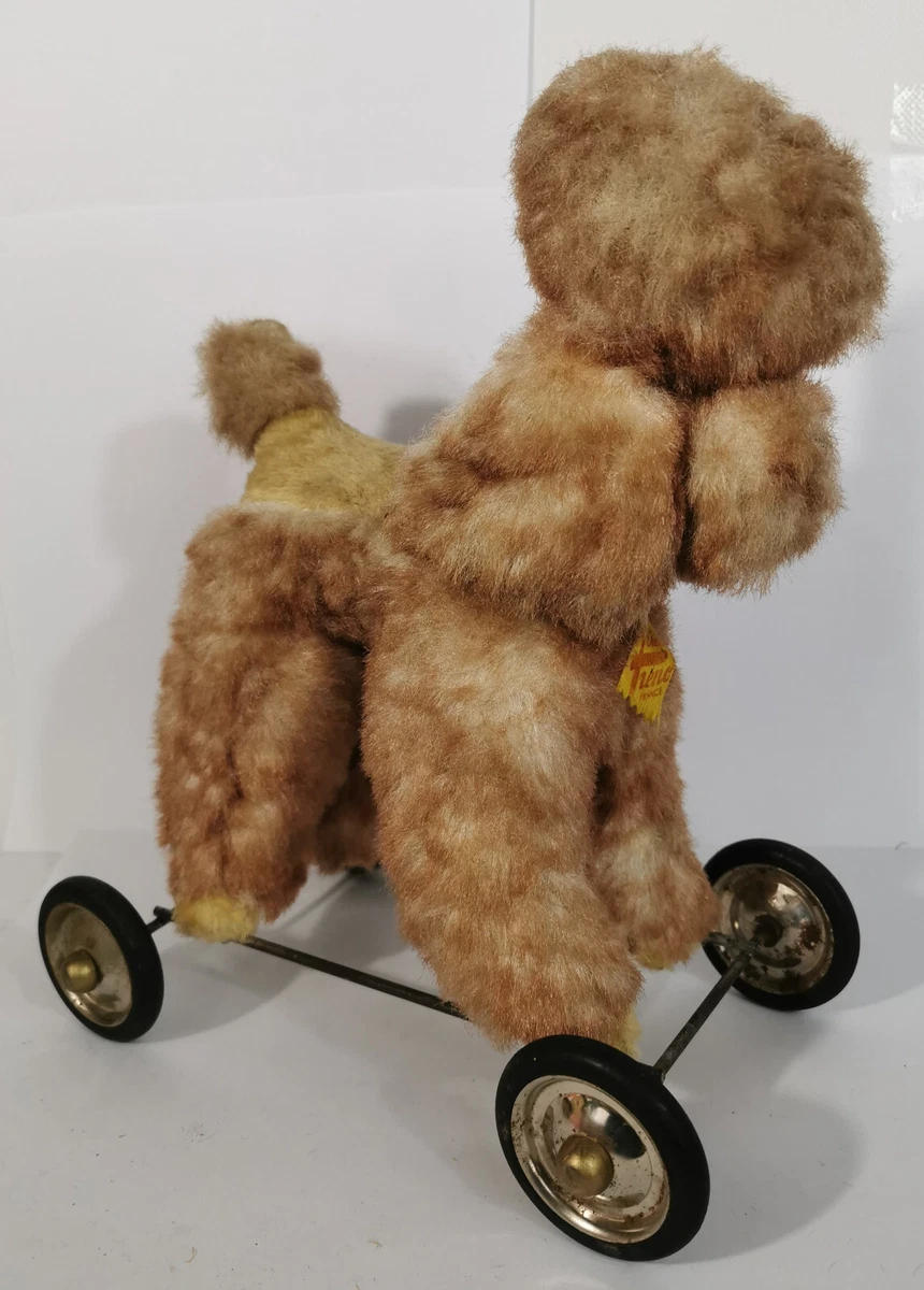 CANICHE NOIR A ROULETTES JOUET PINTEL EN PELUCHE A TRAINER
