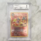 Pokémon Charizard Evolutions #11 Reverse Foil Holo Rare Beckett 9