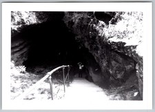 Vtg B&W Snapshot Man Standing At Entrance To Dark Cave With Railing 1950s