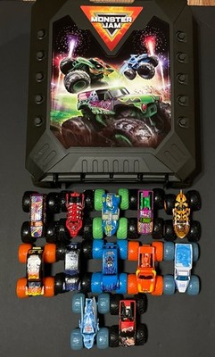 Monster Jam Truck Lot of 12 W/ 15 Slot Monster Jam Rolling Storage Case (1:64)