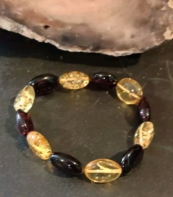 7'' POLISHED OVAL SHAPED CHERRY & HONEY GENUINE BALTIC AMBER STRETCH BRACELET