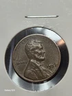1957-D Lincoln Wheat Cent Error. Date Filled In On The 9 And 5.