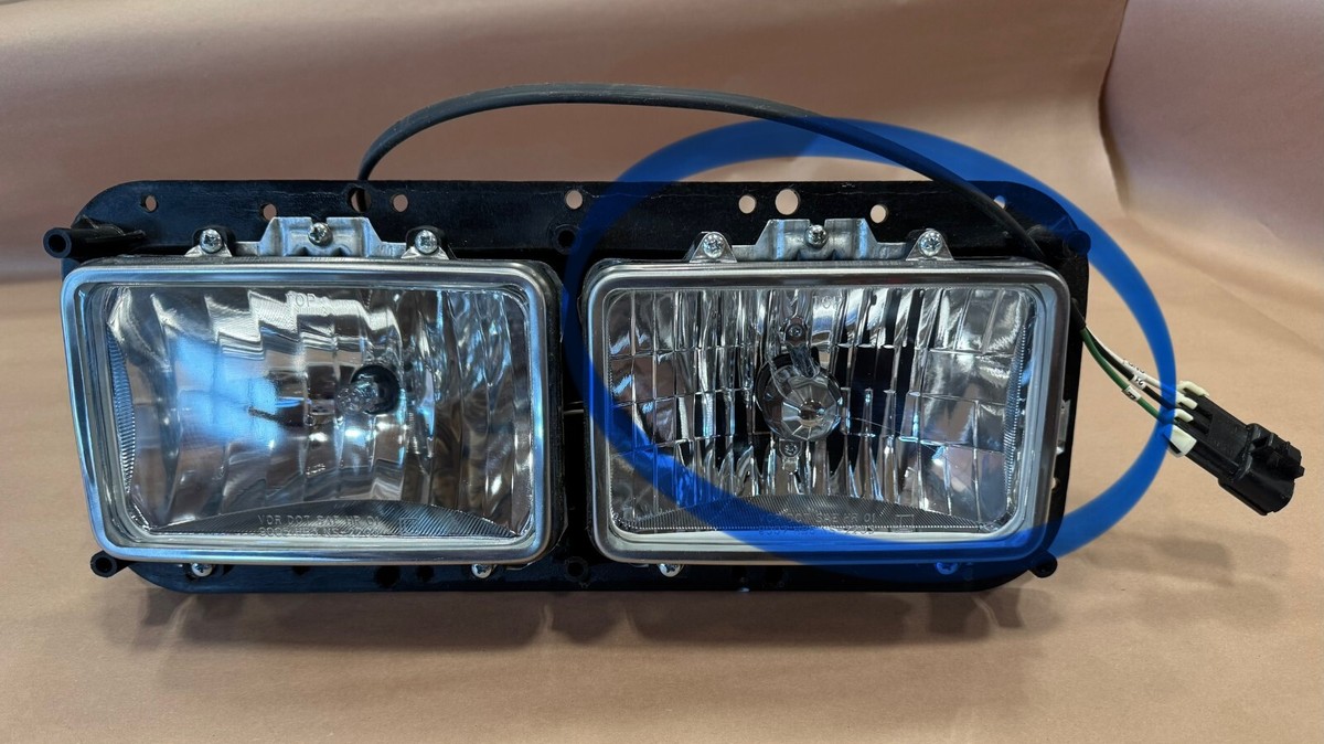 Freightliner HEADLAMP-DUAL Rectangular CHROME BEZEL LEFT HAND SIDE