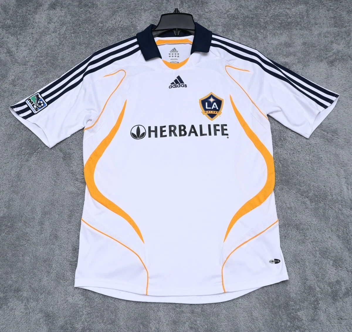 Preços baixos em Tamanho M Branco La Galaxy Roupas e Souvenirs